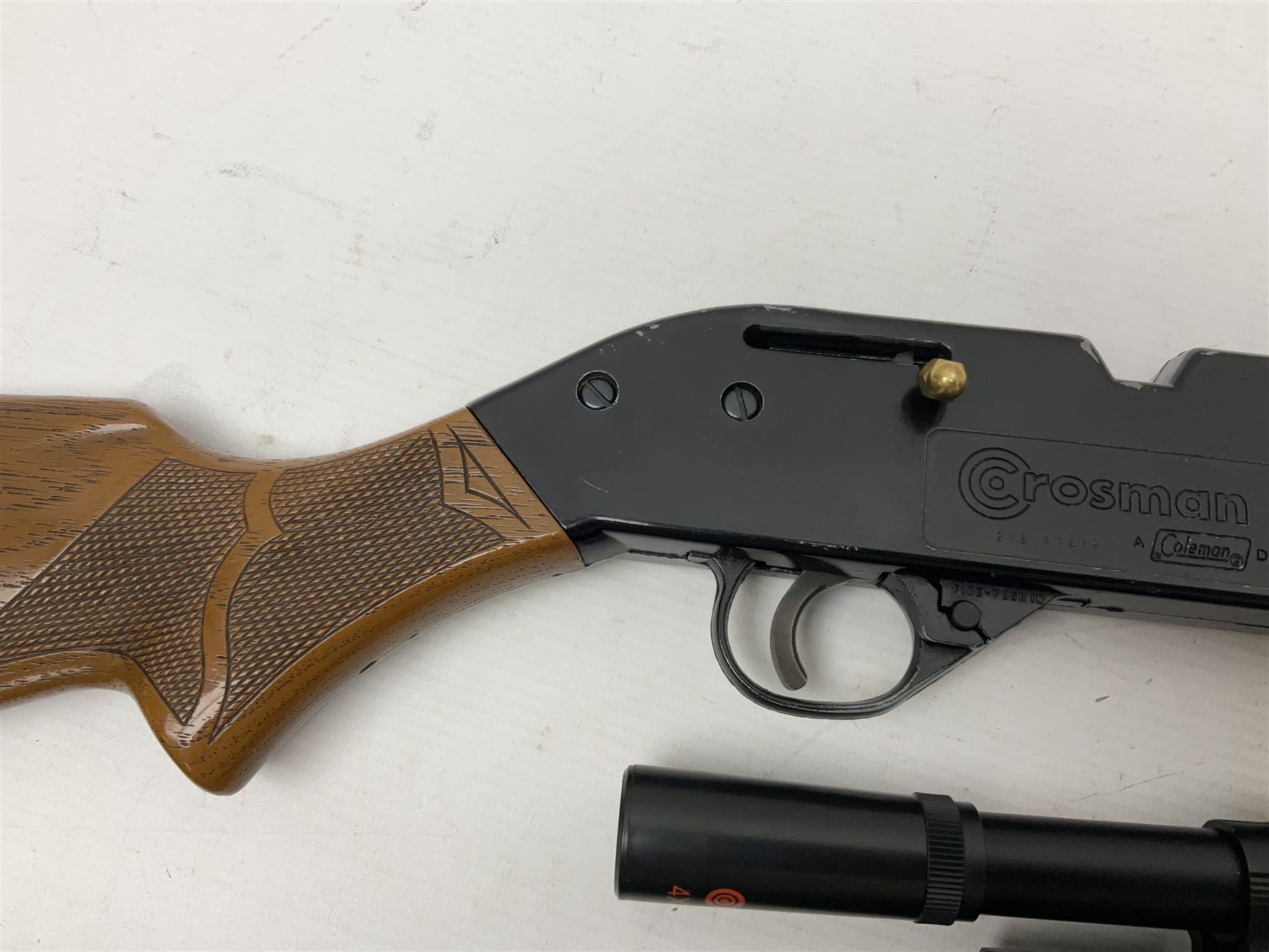 Crosman 760 .177 cal. Junior air rifle with under lever faux pump action and simulated wooden fittings; serial no.278047476, L90cm overall; and SMK B1 Synthetic .22 cal. Youth's air rifle with break-barrel action and 4 x 20 scope; serial no.1721229956084915F, L98.5cm overall (2)  NB: AGE RESTRICTIONS APPLY TO THE PURCHASE OF AIR WEAPONS.