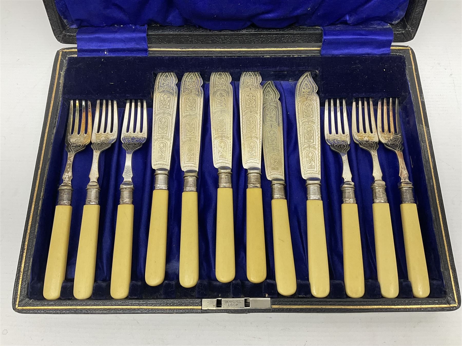 Set of six EPNS fish knives and forks with ivorine handles and hallmarked silver ferrules, boxed, together with a tapering glass decanter with hallmarked silver collar and pair of cut glass salts with hallmarked silver collars, decanter H32cm