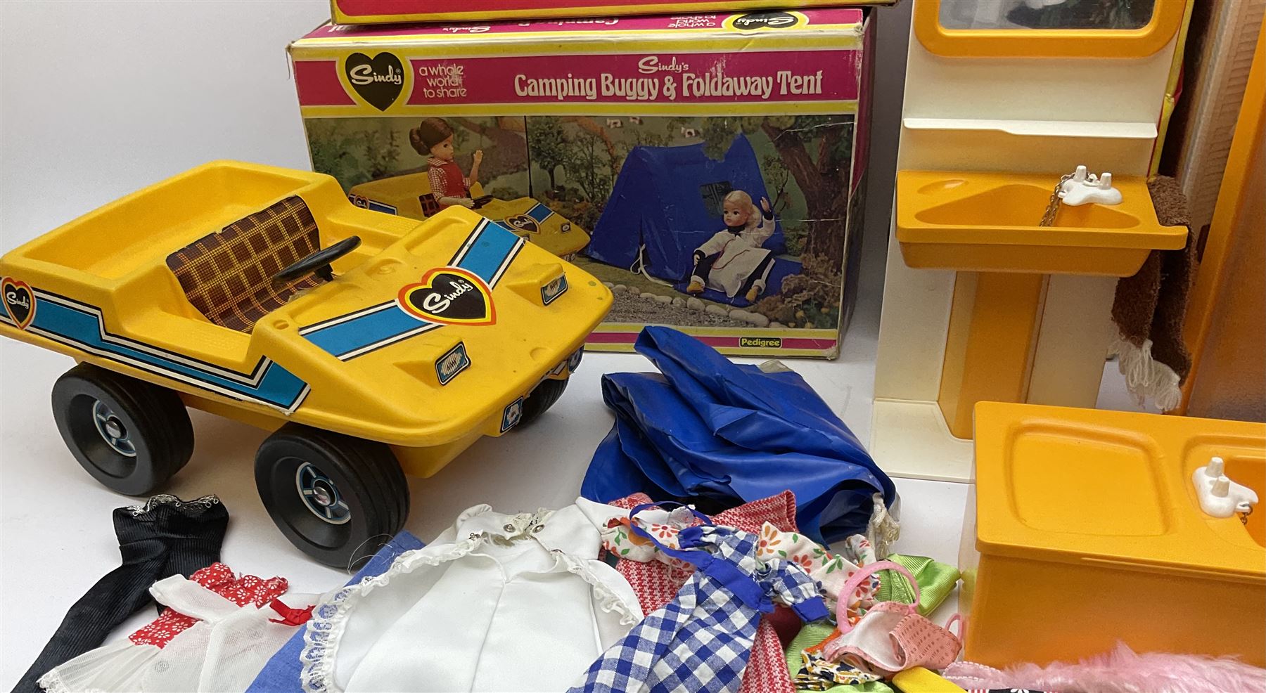Sindy - Camping Buggy and Folding Tent, Bath, Shower, Washbasin unit and Hairdryer; all boxed; together with unboxed kitchen units, dining and bedroom furniture; and two bags of clothing and accessories