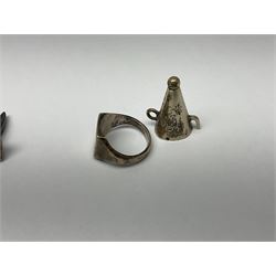 Small group of silver, comprising signet ring, two charms, and two pairs of cufflinks, together with small group of cast metal miniature figures, silk bookmark, etc. 