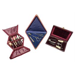 Three sets of sewing implements in fitted cases, to include button hooks and bone handled examples