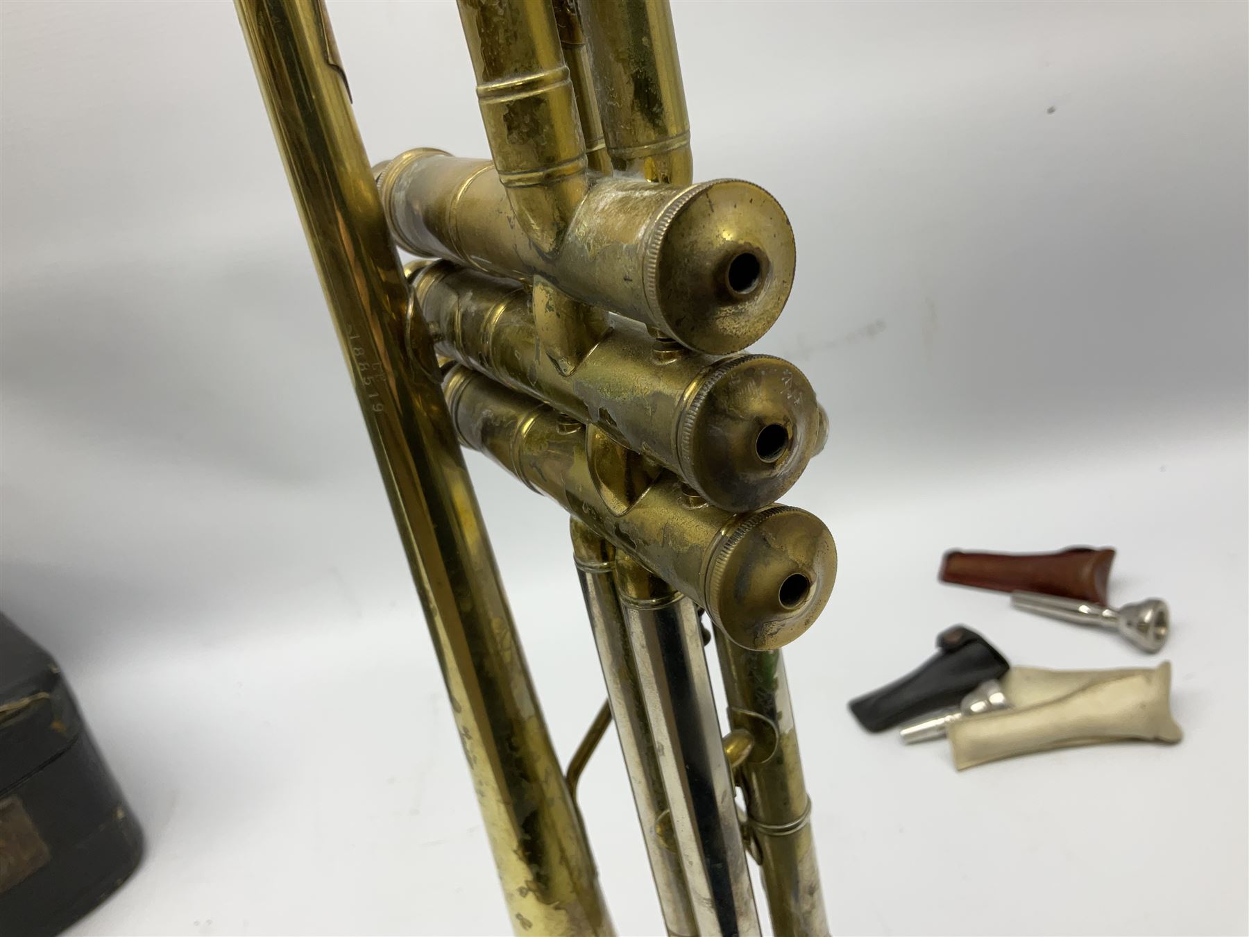 Boosey & Hawkes Emperor brass trumpet L48.5cm; in Henri Selmer carrying case with five mouth pieces and four mutes