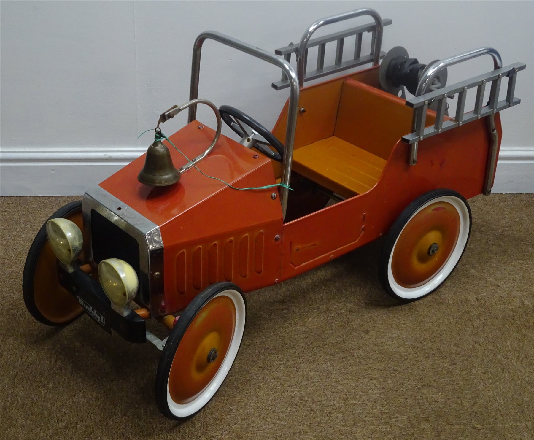 Buddy L tinplate fire truck pedal car, fitted with working bell