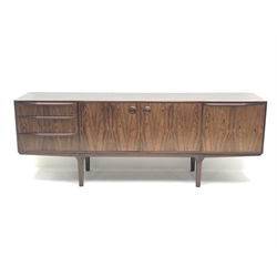 AH McIntosh - 1970s rosewood sideboard fitted with three drawers, double cupboard and fall front compartment, W205cm, H75cm, D44cm - CITES License applied for