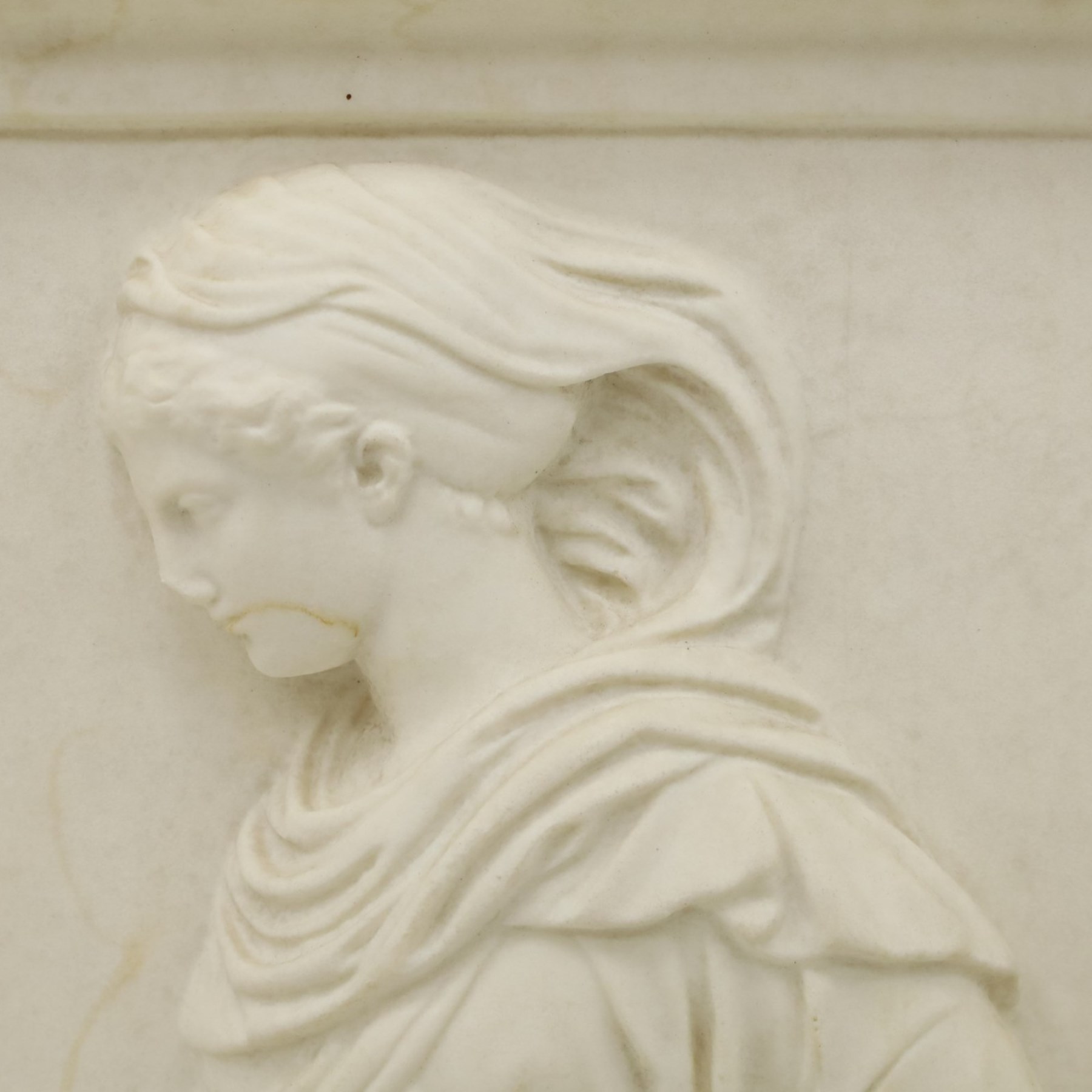 Modern fibreglass wall relief - after the east frieze of the Parthenon, depicting draped figures from the Panathenaic procession in low relief