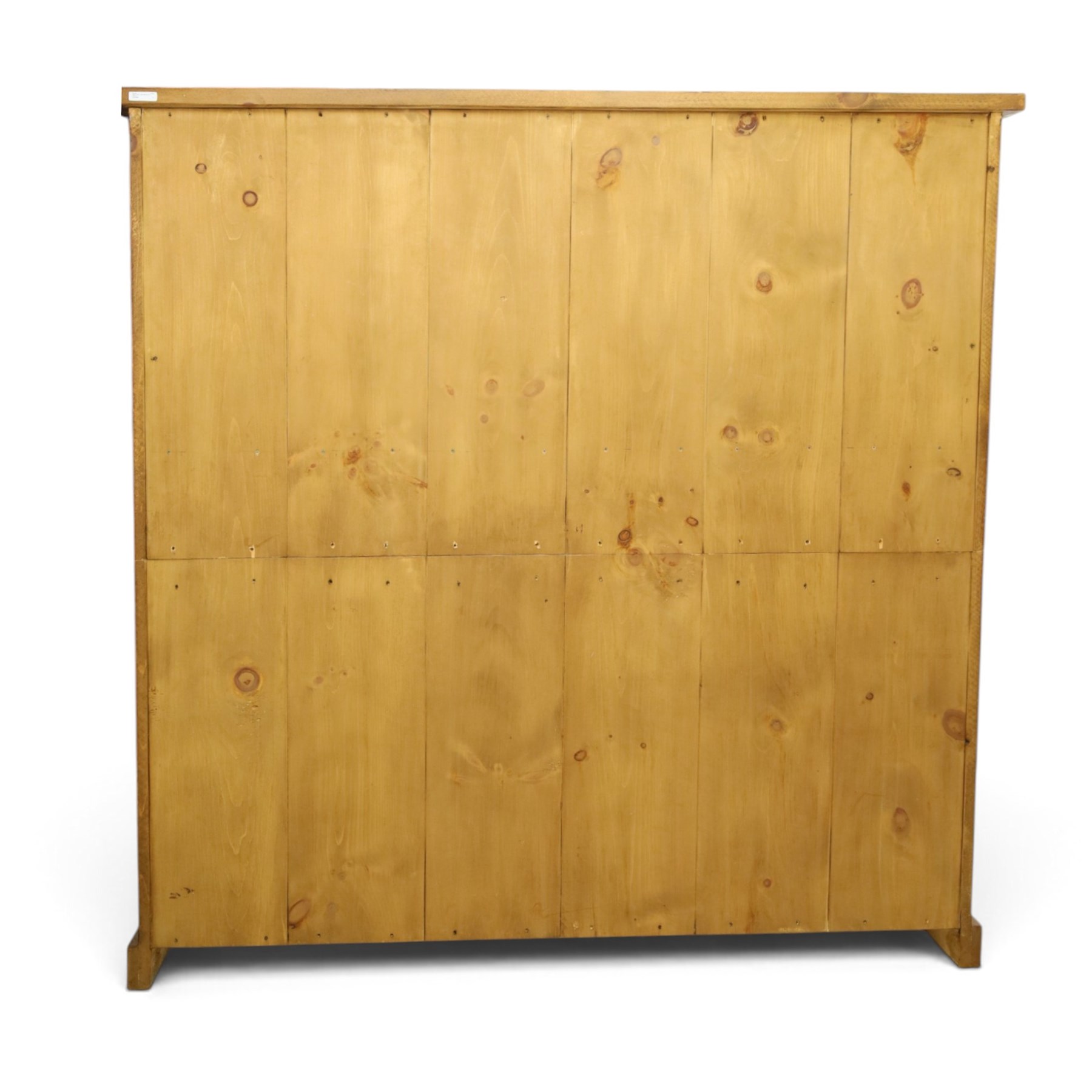 Indigo Furniture - large rustic oak open bookcase, with four adjustable shelves, above a plinth base 