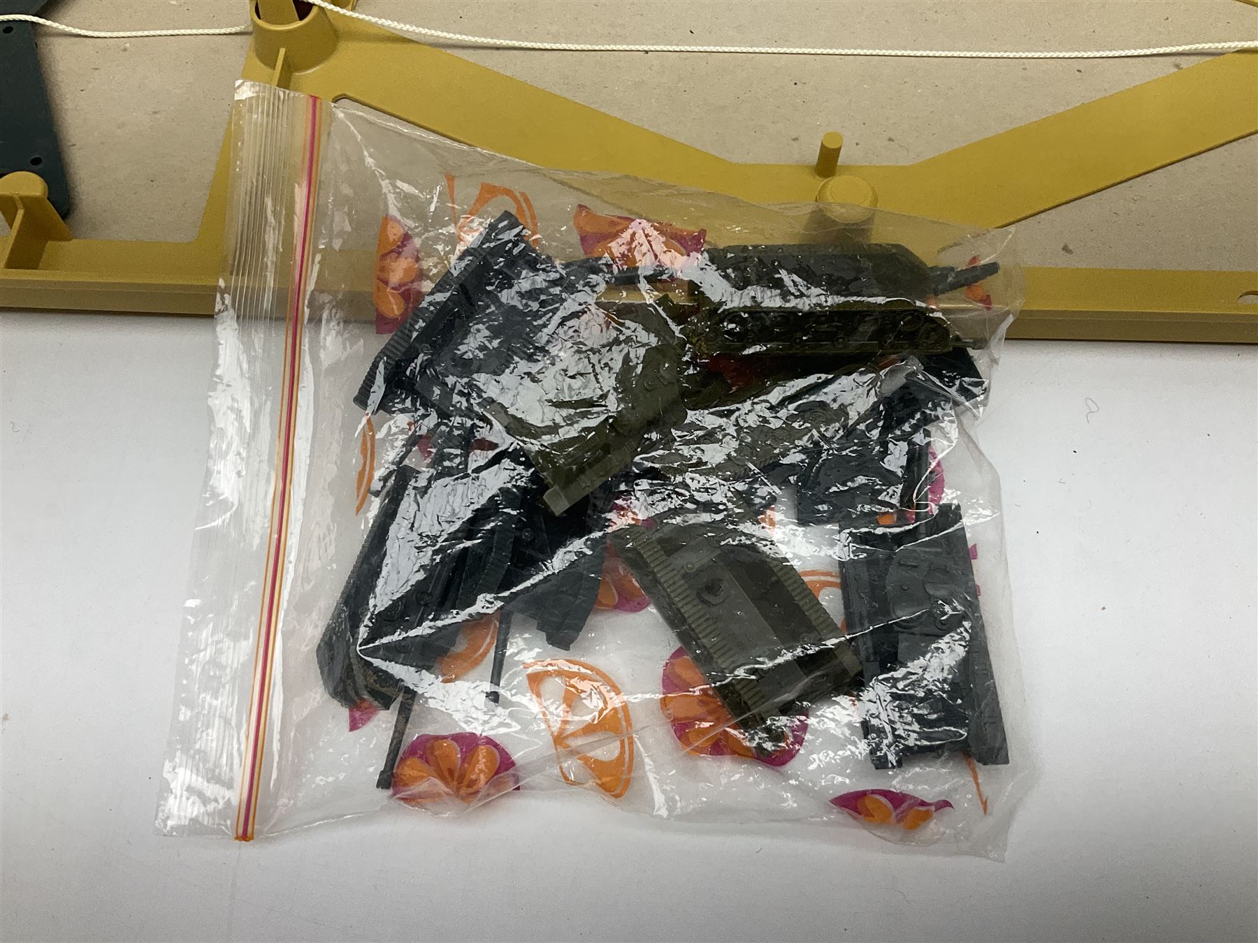 Ideal 'Tank Command' battle action game; boxed; Kay 'Pin Football' bagatelle game; Coleco Cabbage Patch Kids 'Carita Aleen' doll; boxed with certificate; and Palitoy composition head and body doll; boxed (4)