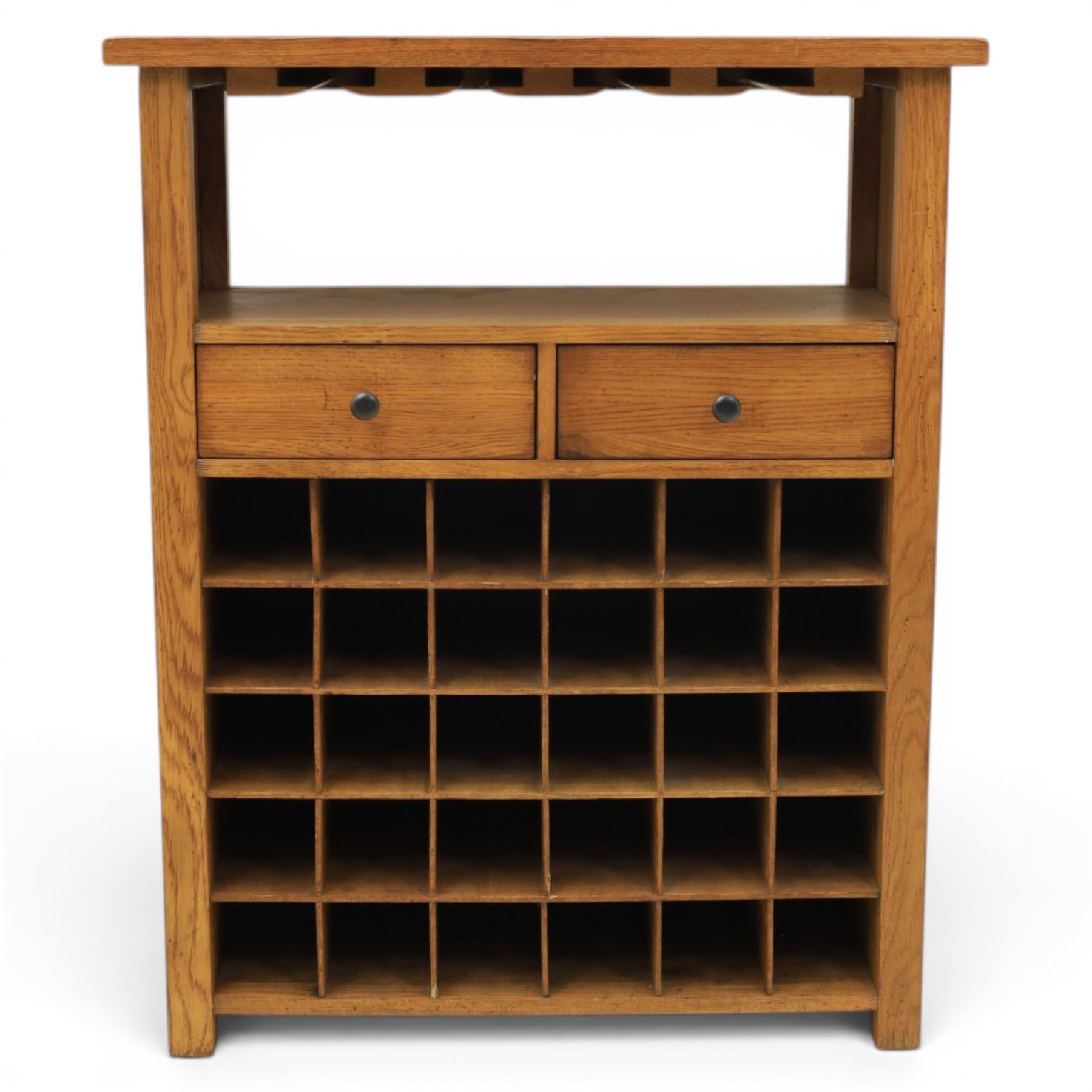 Traditional design light oak wine server, rectangular overhanging top above an open undertier with grooves for wine glasses, fitted with two drawers, lower section with open bottle racks for thirty five bottles, raised on square supports