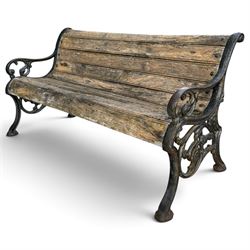 Late 19th/early 20th century Coalbrookdale design cast iron and teak garden bench, the end...