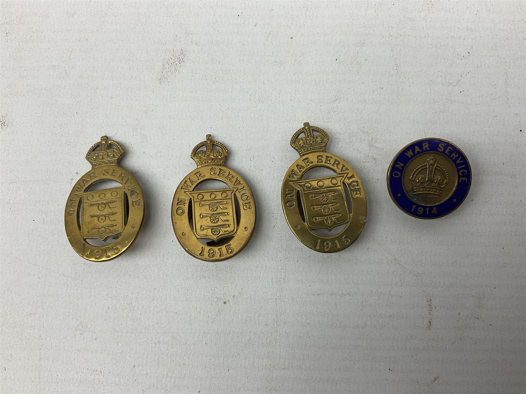 Military metal lapel and pin back badges to include stamped silver Old Coldstreamers Association example and another stamped silver badge, Royal Warwickshire examples, Glamorgan Yeomanry etc