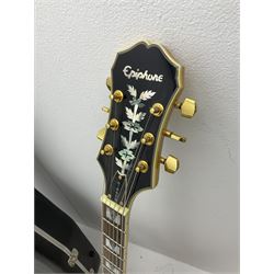 Late 1990s Epiphone Sheraton left handed hollow body electric guitar by Gibson, serial no.99090334, bears label 'Made in Korea', L103cm, in Hiscox fitted hard case; with Squier SP-10 amplifier and XCG folding guitar stand (3)