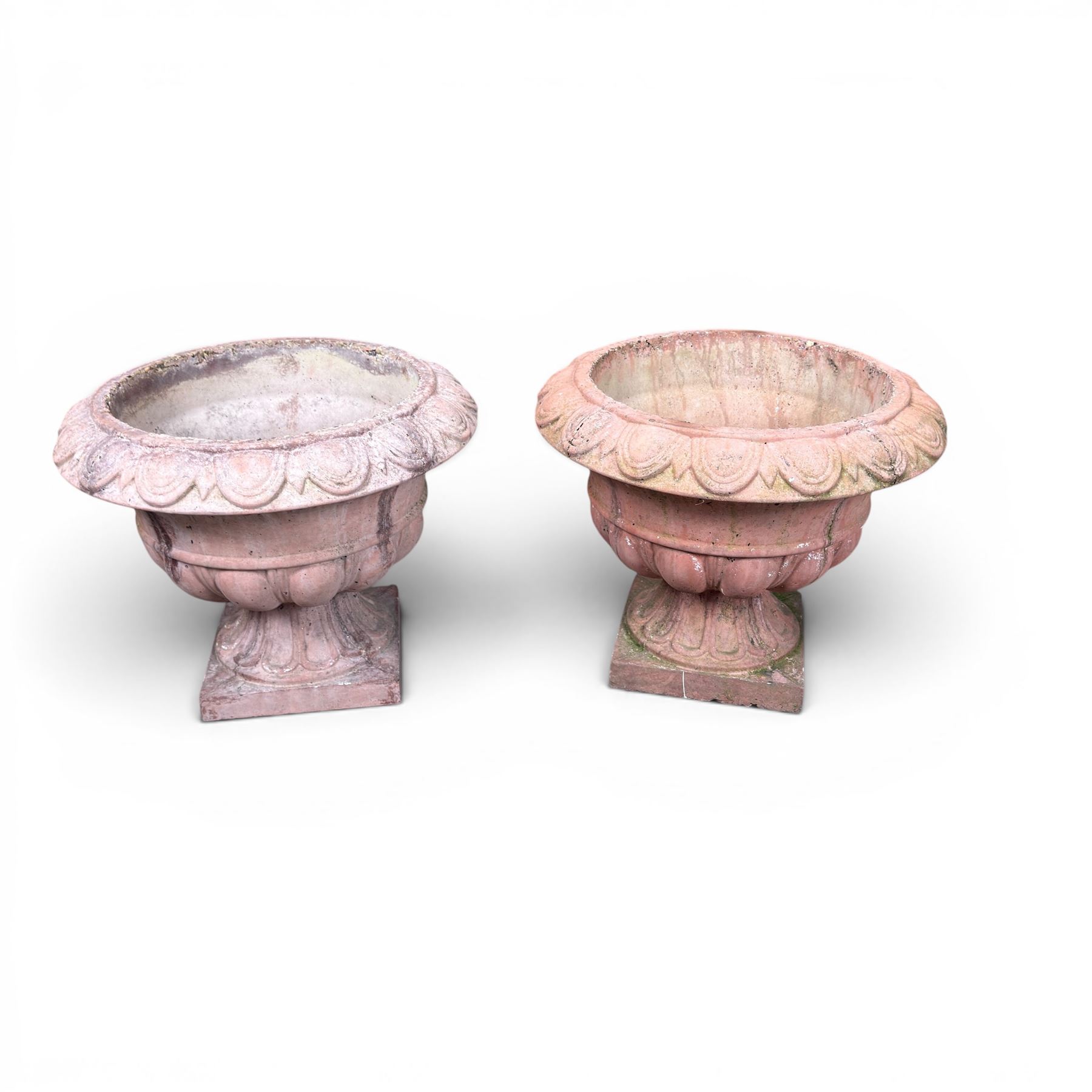 Pair of cast stone stone circular squat planters, egg and dart detail to rim, square base