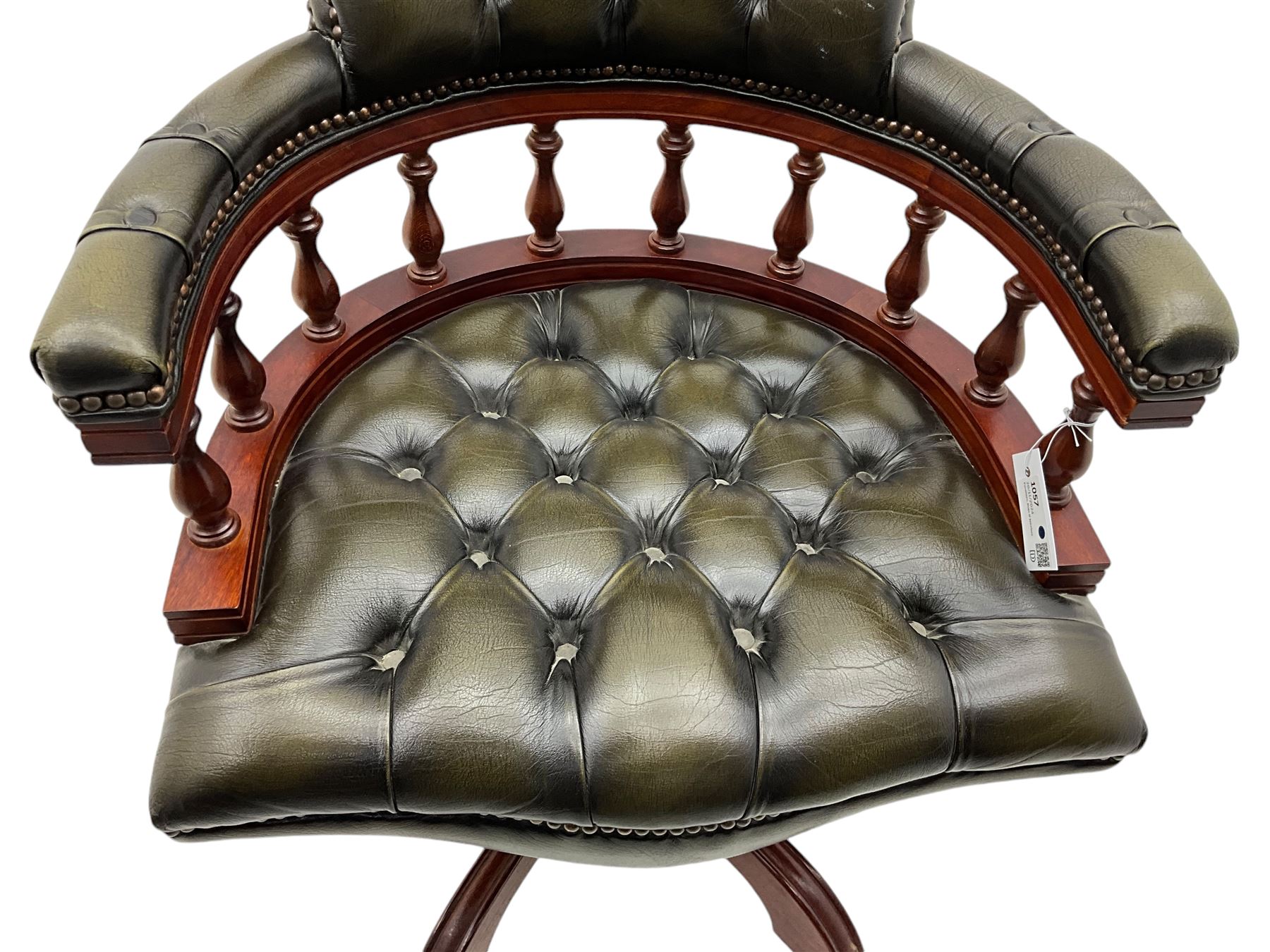 Captain's swivel desk chair, upholstered in studded green leather