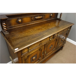  Early 20th century oak sideboard, raised back with barley twist supports, two drawers and three cupboards, geometric moulding, W168cm, H126cm, D59cm  