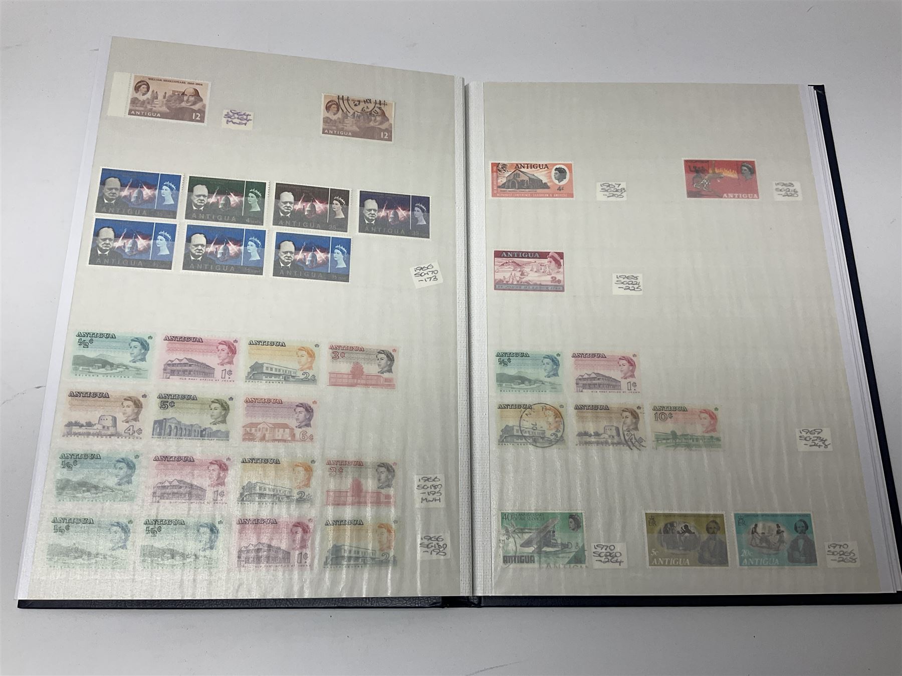 World stamps with many relating to Victory in Europe including King George VI '8th June 1946' stamps from various countries including Antigua, British Guiana, British Honduras, British Solomon Islands, Cayman Islands, Ceylon, Fiji, Grenada, Montserrat, St Helena etc, both mint and used stamps seen, housed in three stockbooks