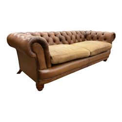 Chesterfield sofa, 2/3 seater upholstered in deeply buttoned tan leather