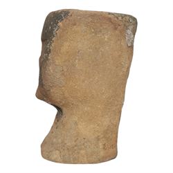 Sandstone carving, modelled as a stylised anthropomorphic head with simple facial features, H30cm
