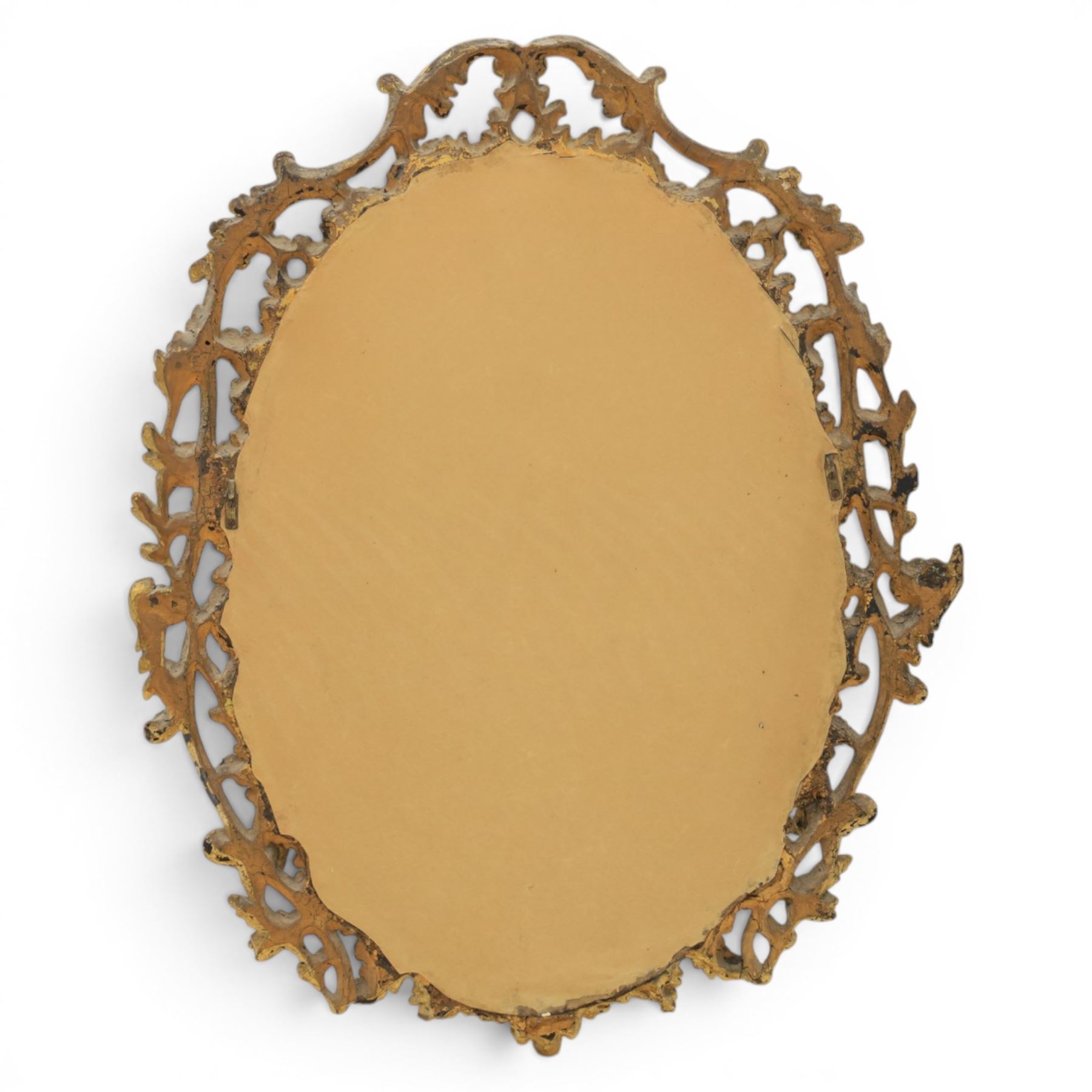 Rococo design gilt framed oval wall mirror, pierced frame with foliate design 