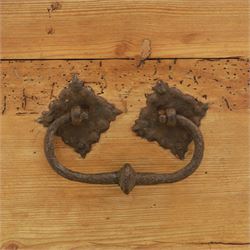 Early 20th century pine coffer, domed lid over plain front and sides with exposed dovetail joints, iron hasp and staple to front