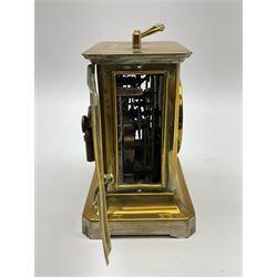 Late 19th century German Junghans “Joker “carriage clock with a musical alarm, engraved rectangular dial plate, circular card dial within an integral glazed bezel, roman numerals, minute track and alarm dial, steel spade hands, glass side panels (one missing) and rear case door, thirty-hour spring driven movement, pin pallet balance escapement, rear wound and set. 
With key.
