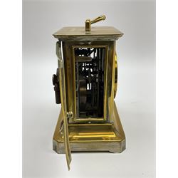 Late 19th century German Junghans “Joker “carriage clock with a musical alarm, engraved rectangular dial plate, circular card dial within an integral glazed bezel, roman numerals, minute track and alarm dial, steel spade hands, glass side panels (one missing) and rear case door, thirty-hour spring driven movement, pin pallet balance escapement, rear wound and set. 
With key.
