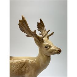 A Beswick Deer family, comprising Stag, Doe and Fawn. (3).  