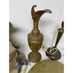 Bronzed ewer heavily embossed with flowers, together with a cast brass lamp base, three fabric tassel lamp shades and a mottled glass ceiling lamp shade 