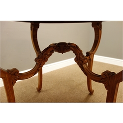  20th century walnut circular centre table, quarter veneer top with ebony stringing, four scrolled supports with acanthus leaf carving, D77cm, H73cm  