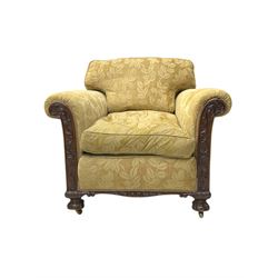 Early 20th century mahogany framed three-piece lounge suite - three-seat camelback sofa (W203cm, D105cm); pair of matching armchairs (W95cm, D96cm); upholstered in neutral foliate pattern fabric, carved with trailing leafy branches, ball and claw carved feet with brass castors 