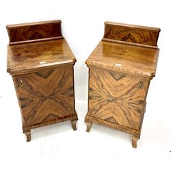 Pair of Art Deco walnut bedside cabinets, raised shaped back above single door,  cabriole legs