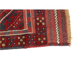 Meshwani Kilim maroon ground runner rug, the field with four central indigo lozenges surrounded by geometric borders