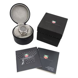 Tag Heuer 2000 gentleman's stainless steel automatic chronograph wristwatch, Ref. 169.306, black dial with triple register recording hours, minutes and continuous seconds and date aperture, boxed with papers
