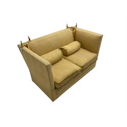 Edwardian knole design drop-arm two seat sofa, upholstered in yellow damask fabric with sprung back and seat and matching bolster cushions
