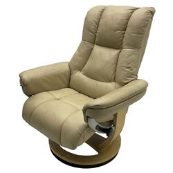 Reclining armchair upholstered in cream leather