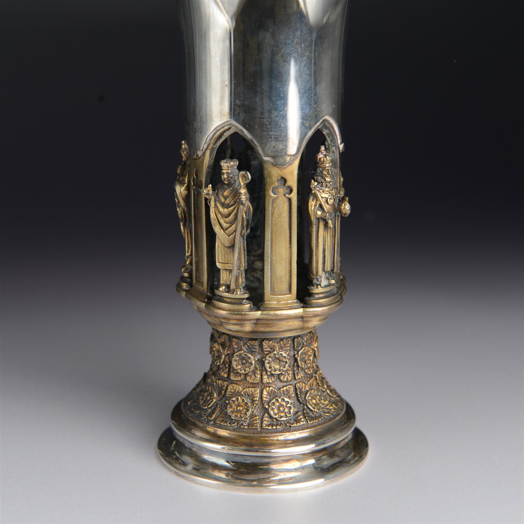 Modern limited edition silver goblet, 'made by order of the Lord Bishop of Ripon to commemorate the foundation of the Diocese in 1836', designed by Hector Miller for Aurum, the plain fluted cup, upon an ornate figural parcel gilt stem and stepped circular foot, no. 112/500, hallmarked Hector Miller, London 1985, H17cm, with certificate