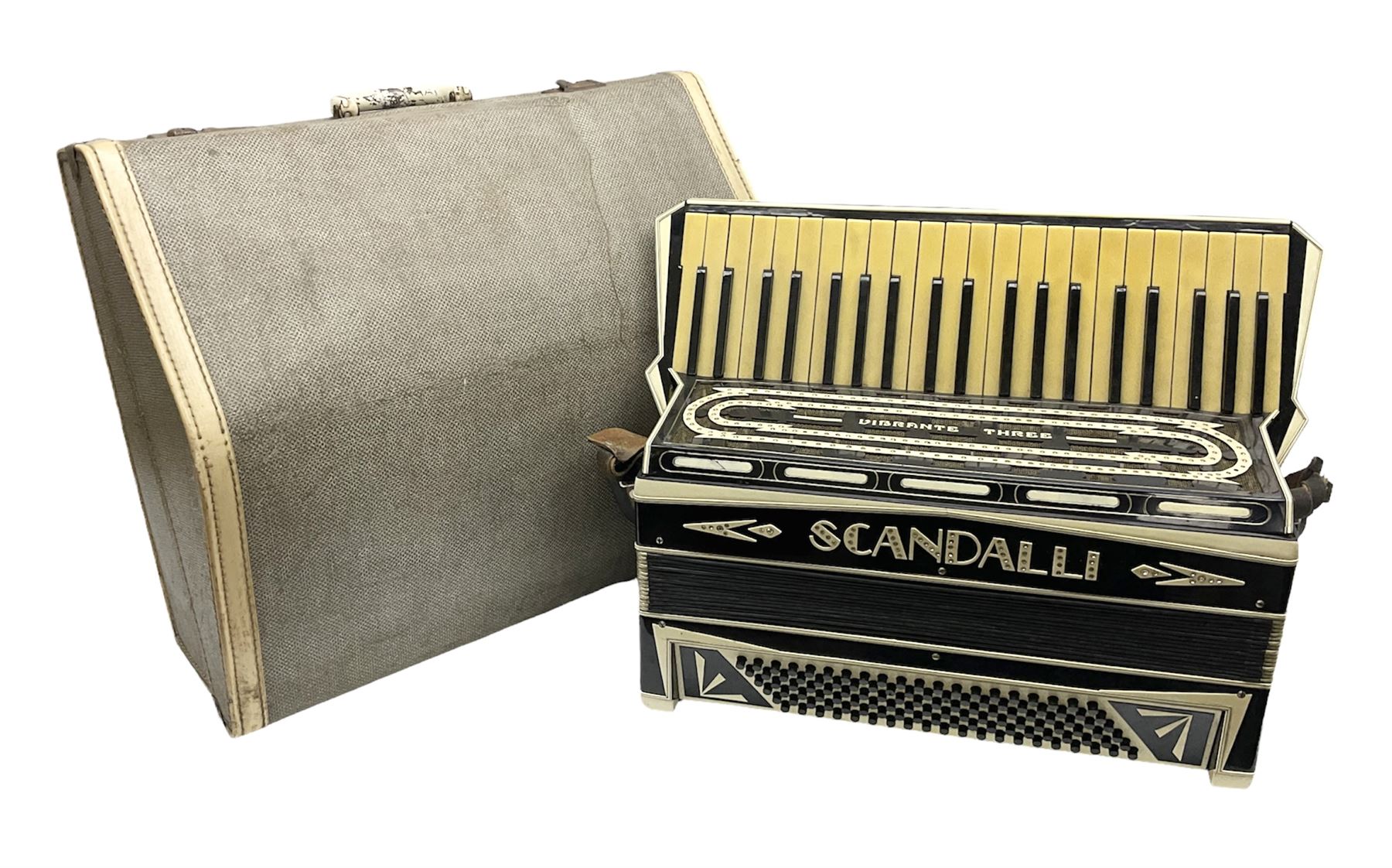 Scandalli Vibrante Three piano accordion in Art Deco black and white case with jewelled decoration, twenty-four keys and one-hundred and twenty buttons; inscribed '5700 Camerano Italia'; serial no.3414 L54cm; in carrying case with strap