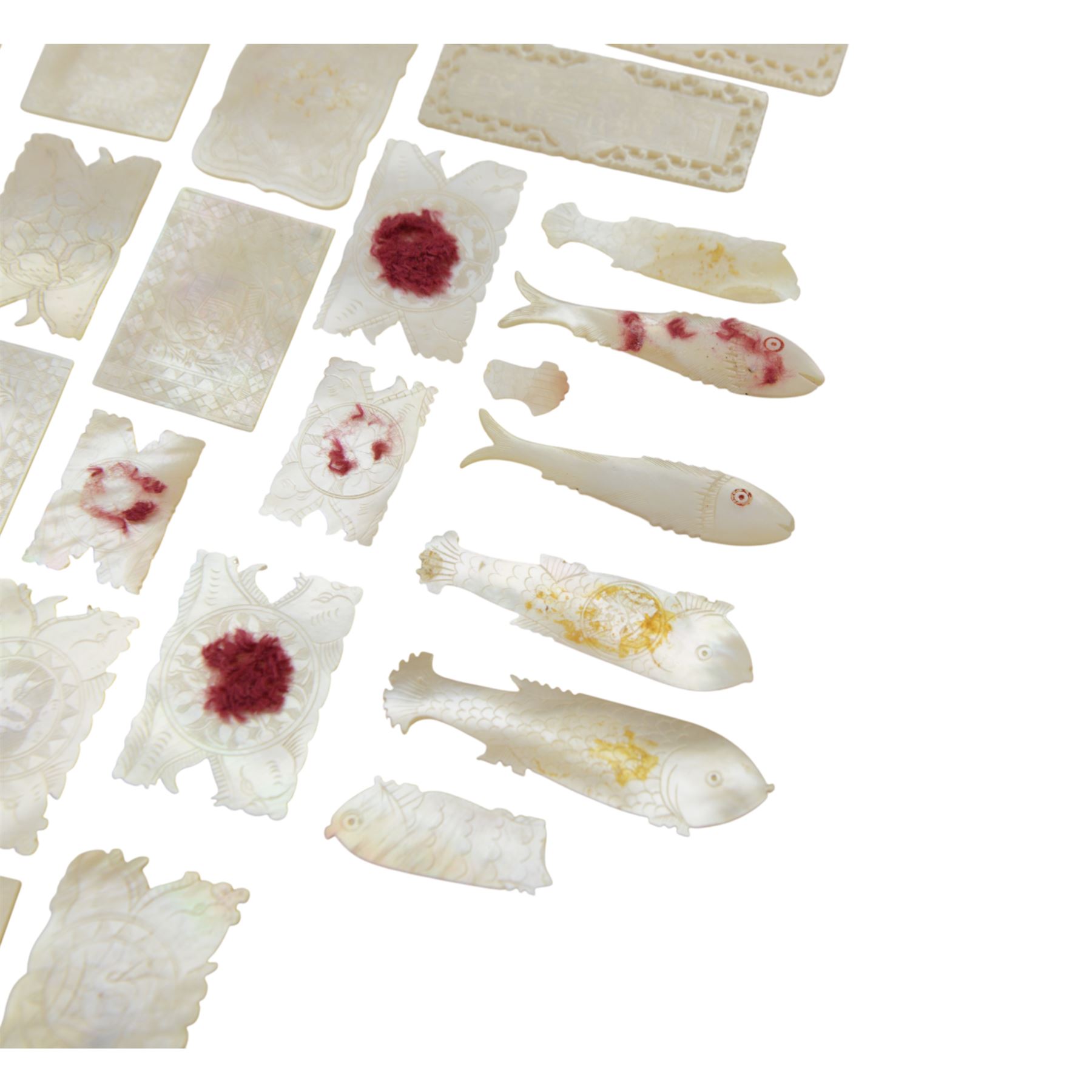 Chinese mother of pearl gaming tokens, of varying shape and design, including carved and engraved examples