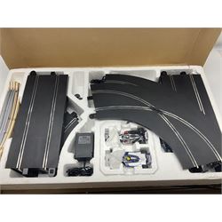 Scalextric - Formula One set with McLaren Mercedes and Williams BMW cars; and Speed Extreme set with Ford Focus cars; both boxed with accessories and paperwork; and Parker Pro-Action football game; boxed (3)