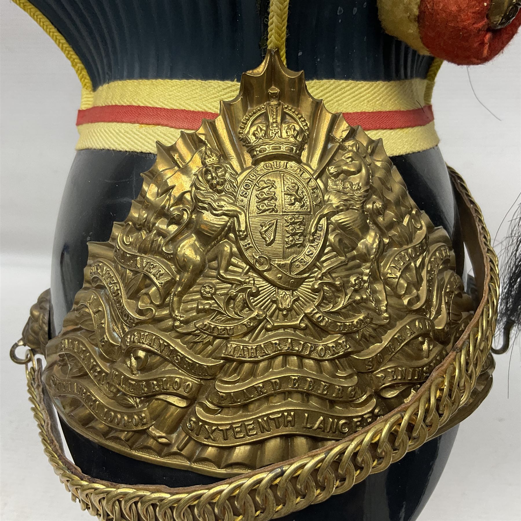 Lancers cap with original 19th century fittings for the 16th Lancers on a modern fibre glass shell with liner