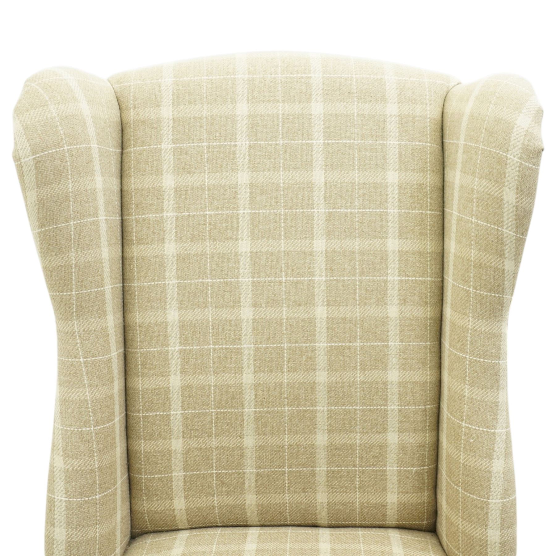 Contemporary wing back dining chair, fully upholstered in beige plaid fabric with studded edge detail, shaped back and seat, raised on tapering supports