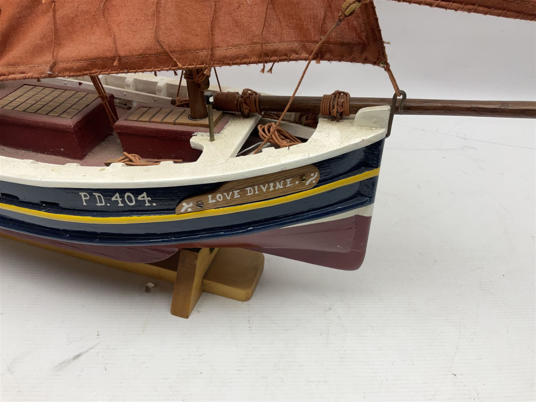Wooden model of the Peterhead Herring Fishing Boat, Love Divine, PD404. on stand together with Wick Herring Fishing Boat, Galilee WK.1. on stand, L105cm, H64cm