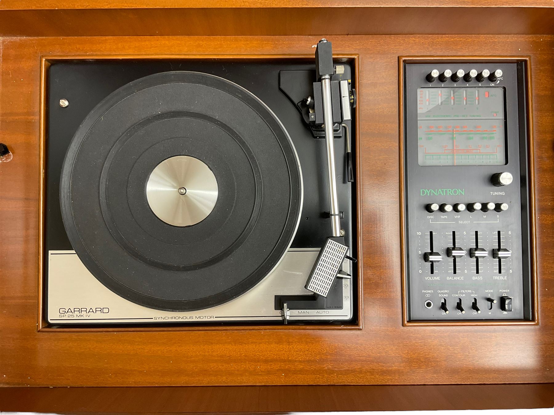 1970s mahogany radiogram with ‘Garrard’ SP25 MK IV turntable and integrated speakers