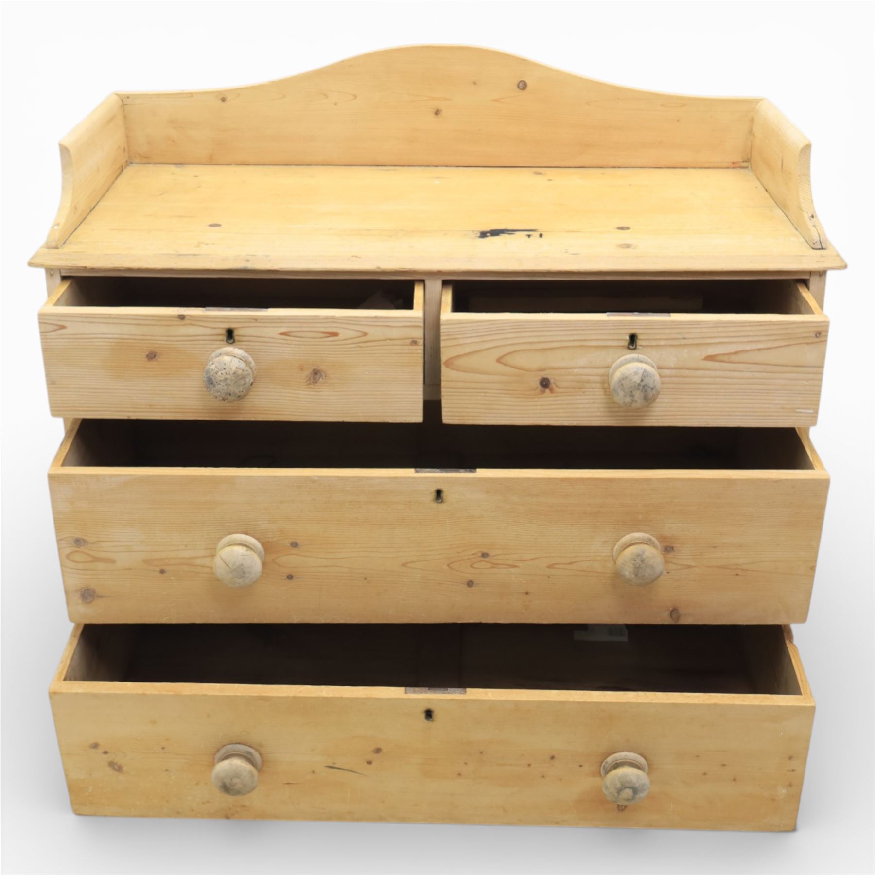 20th century pine chest of drawers, shaped galleried top, above two short over two long drawers, raised on bracket feet