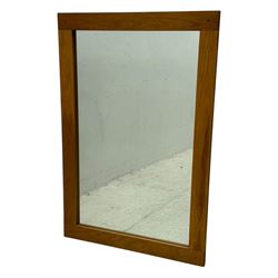 Four decorative mirrors, including gold-toned triptych dressing mirror with foliate borders, two rectangular framed mirrors and a circular gilt mirror with ornate edging