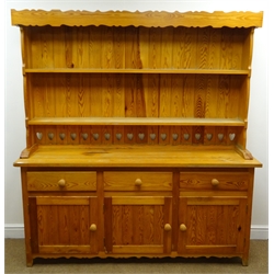  Pine kitchen dresser, with twin shelf back above three drawers and three cupboards, tapered supports, W172cm, H183cm, D45cm  