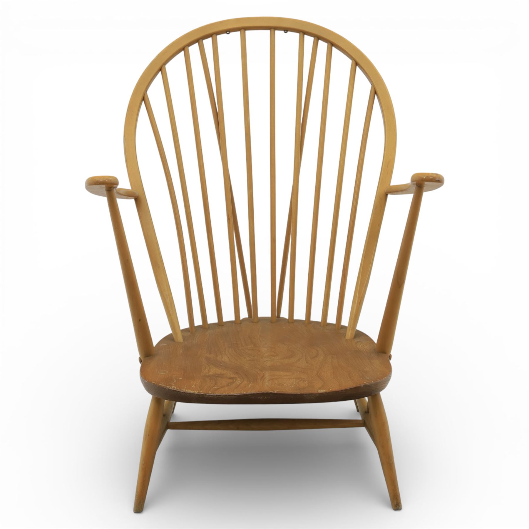 Ercol - Mid 20th century elm and beech Windsor armchair, the hooped spindle back over a shaped elm seat, with scroll front armrests on turned supports, raised on splayed tapering legs united by stretchers, lacking loose seat cushion