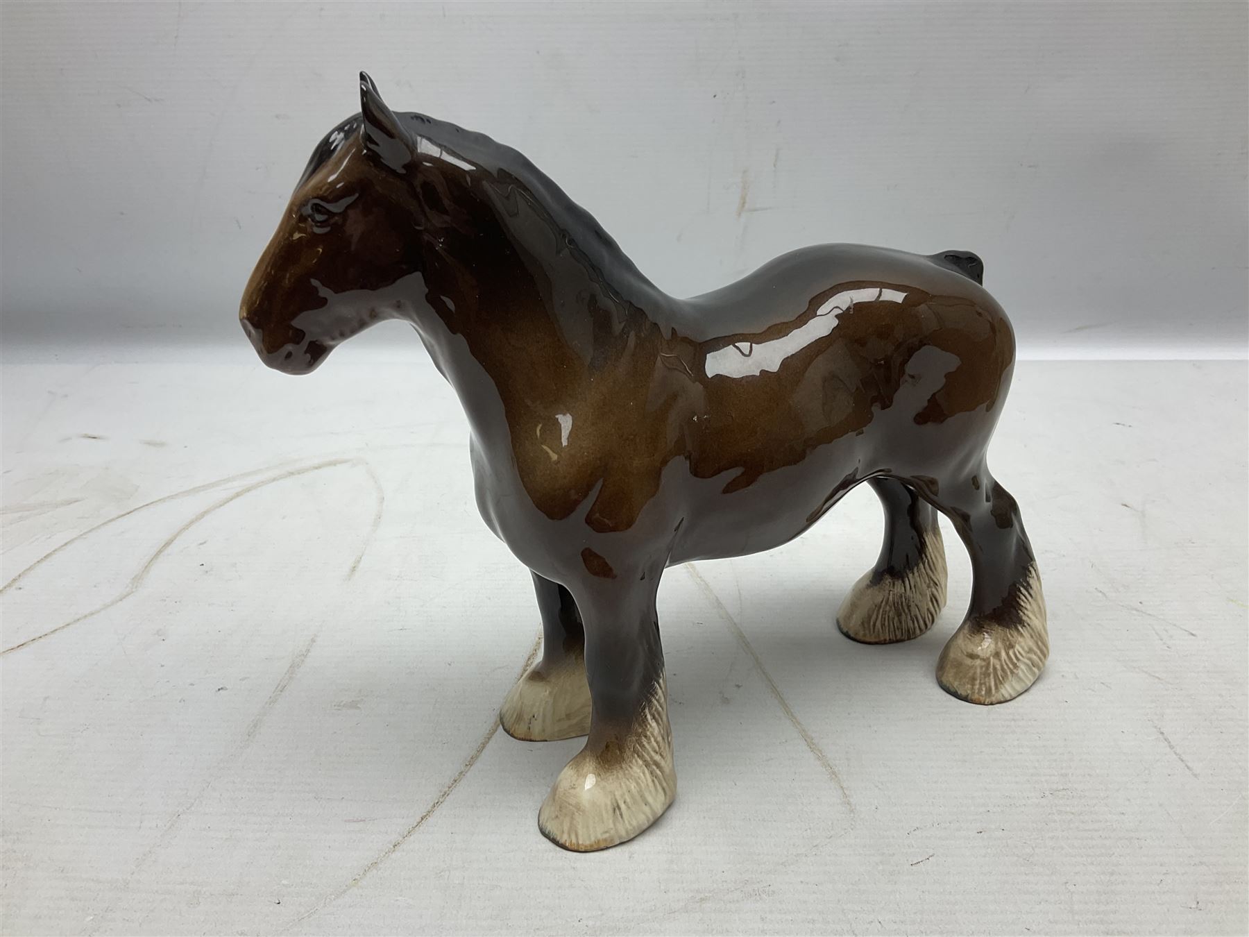 Two Border Fine Arts figures, comprising Badgers and Blackbird, together with Beswick bay shire horse no 818 and another figure