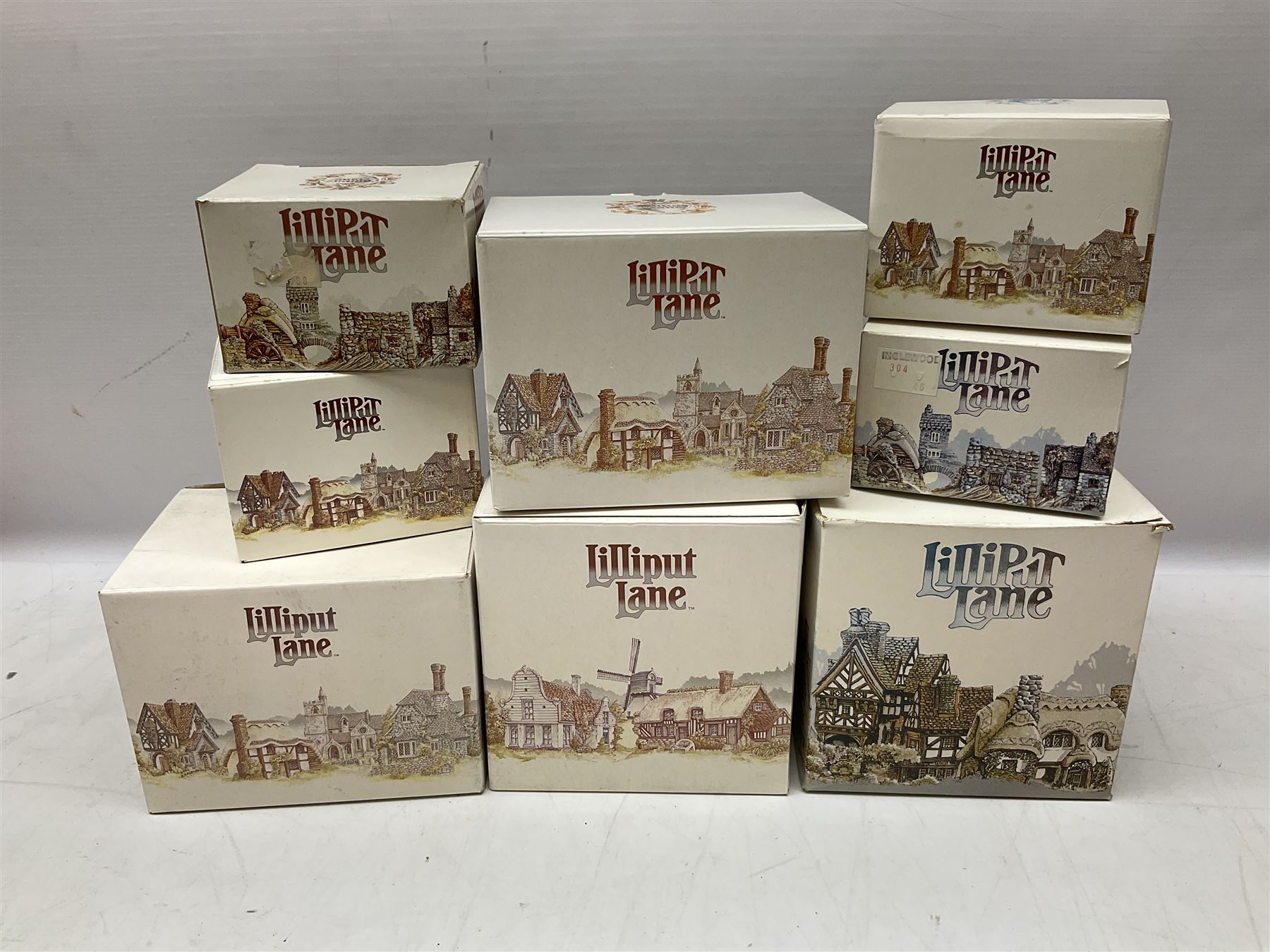 Eleven Lilliput Lane models, to include St Marks, Rose Cottage, Puffin Row, Village School, Swan Inn etc, all boxed