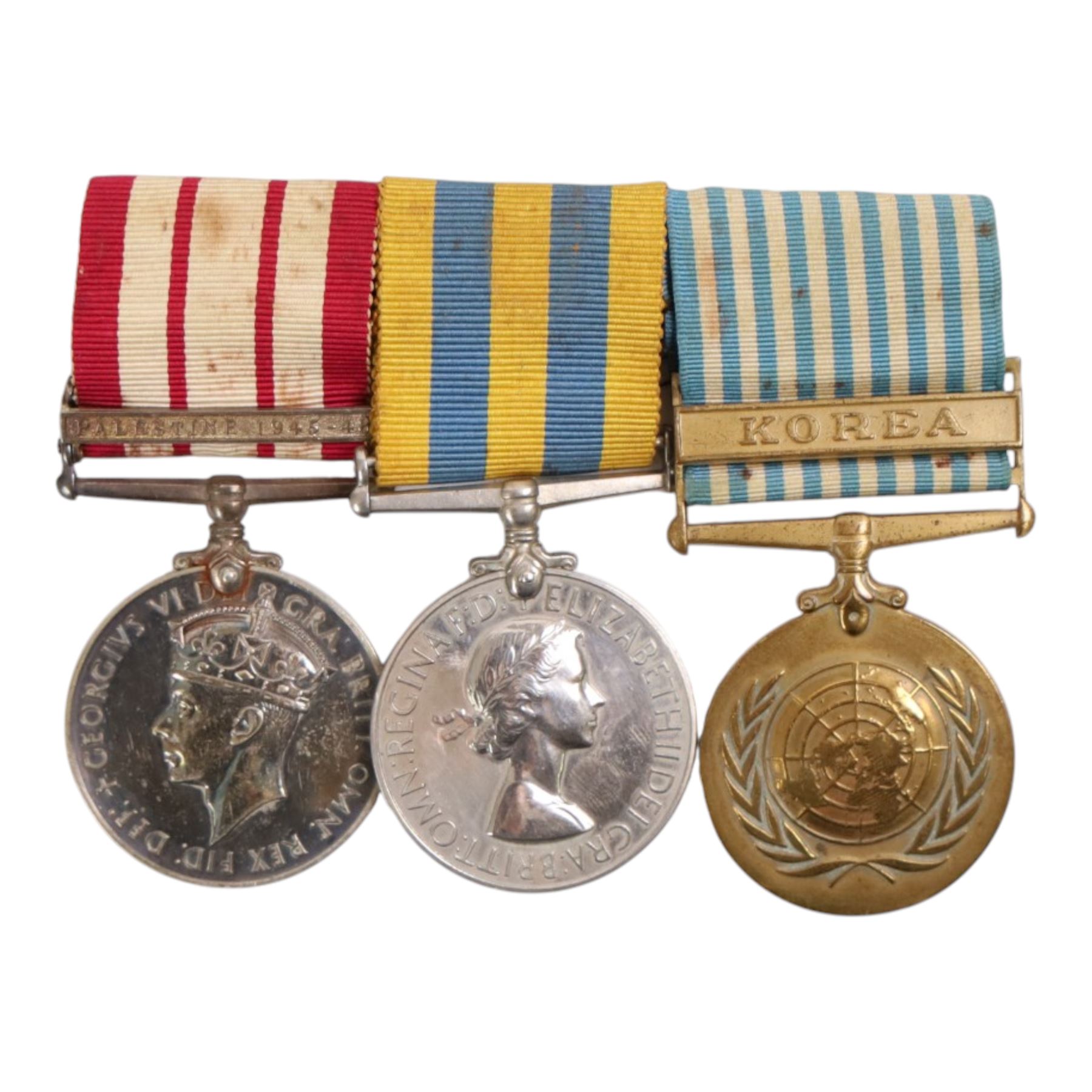 Medal group, comprising Navy General service medal with Palestine 1945-48 clasp, Queen Elizabeth II Korea Medal, and the NATO Korea Medal, with ribbon bar and Imperial Service Medal awarded to D/JX 661418 H. E. Severs L.Ten R.N