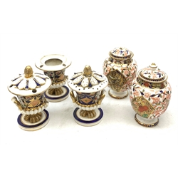 Three Bloor Derby Imari pattern twin handle urms, two examples with covers, each with mark beneath, H12cm, (all a/f), together with a pair of late 19th century Royal Crown Derby Imari pattern urns and covers, each with mark beneath, H13cm, (one significantly a/f). 